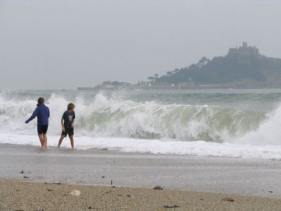 Dodging the waves at Marazion