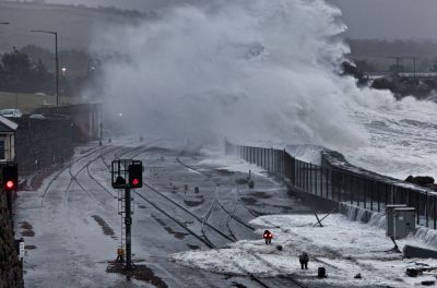 Waves over Penzance train line